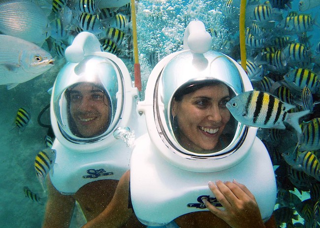 Leslie and her boyfriend enjoying their sea trek tour in Cozumel.